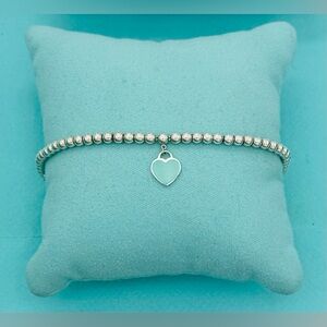 Tiffany sterling silver 4mm bead bracelet with signature enamel heart RTT